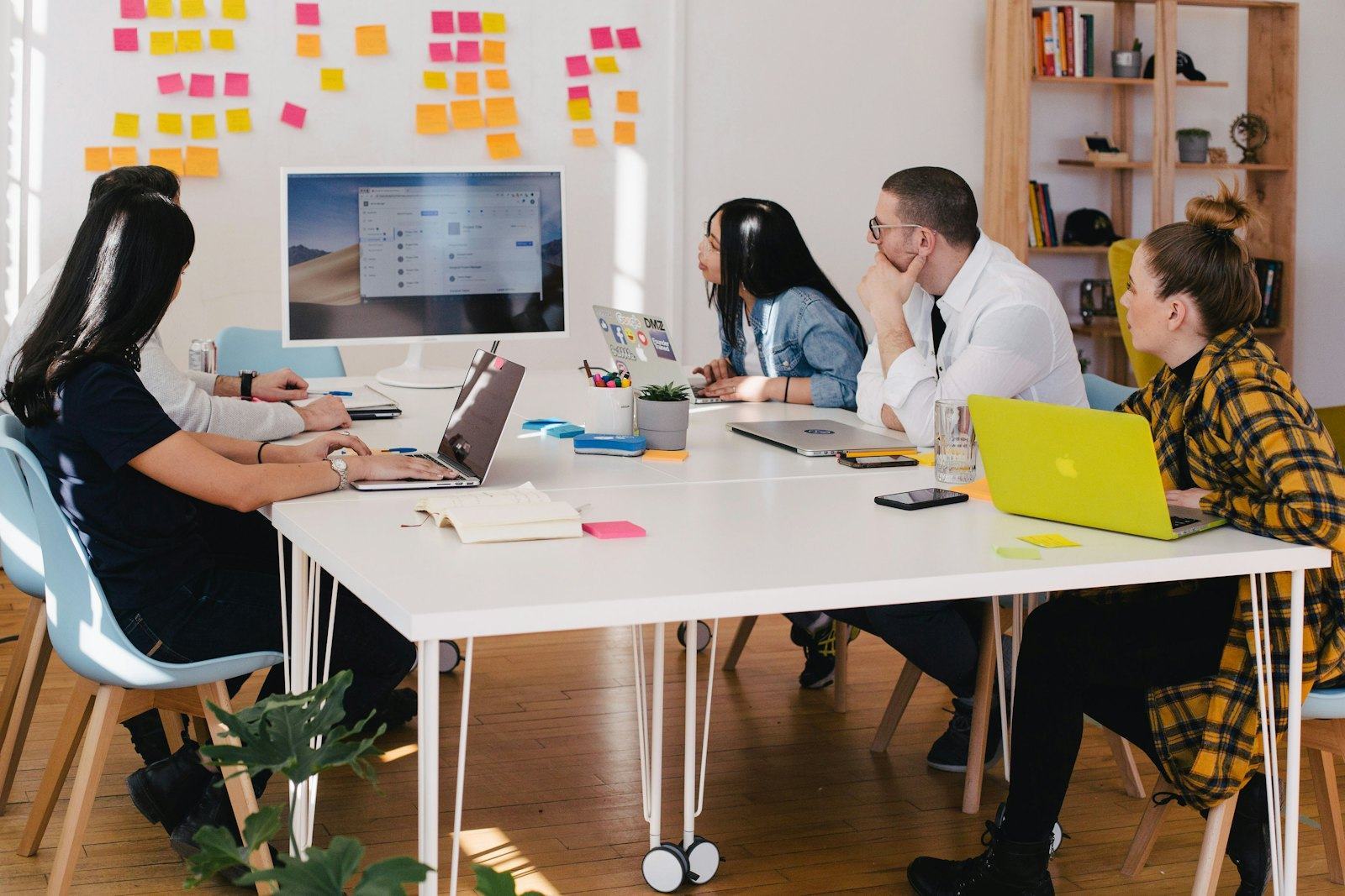 A founder answering questions from investors across a table