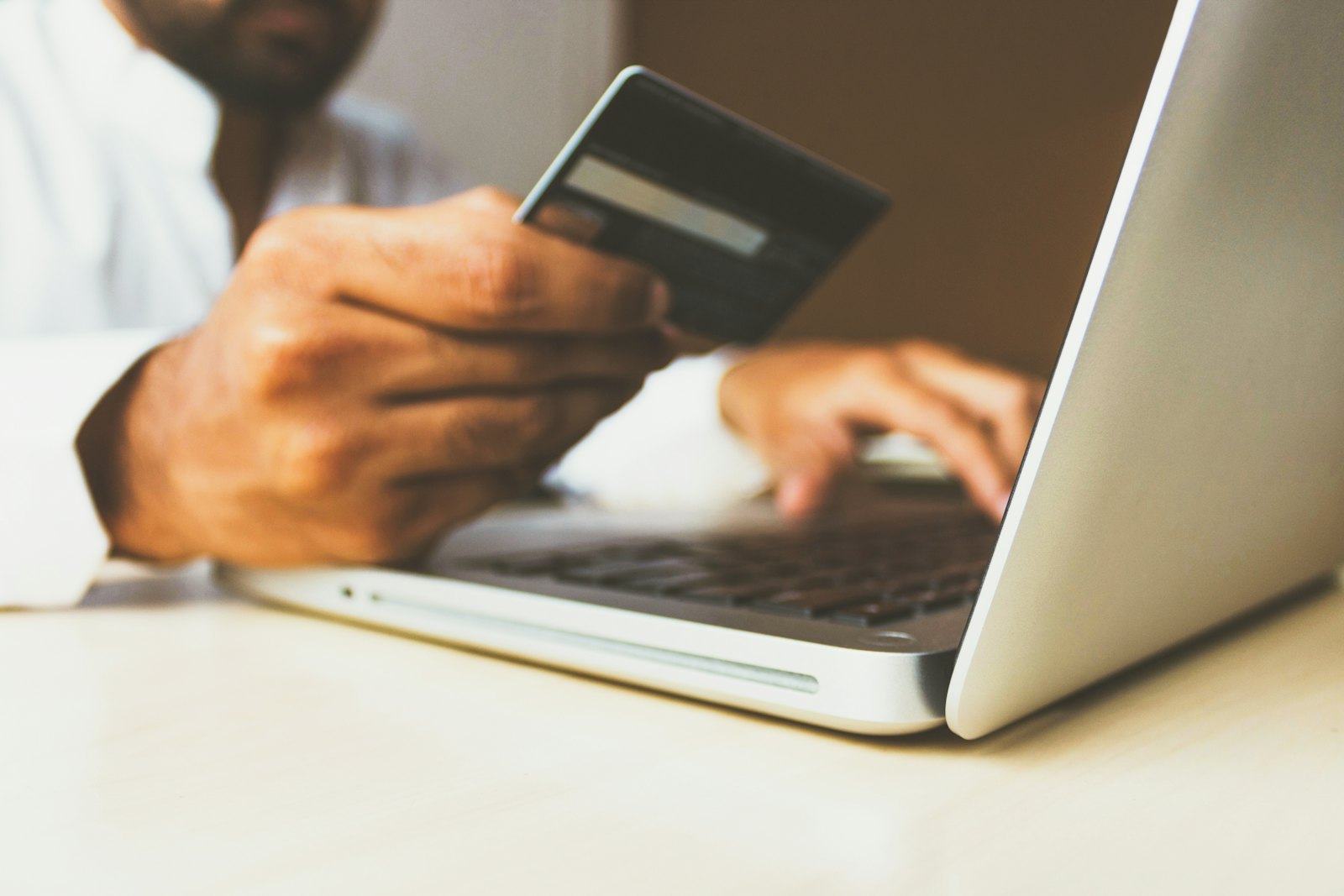 A payment being taken on a laptop